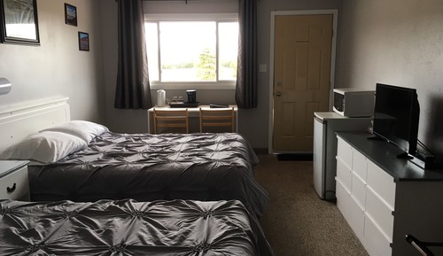 Habitación estándar, 2 camas de matrimonio, frigorífico y microondas