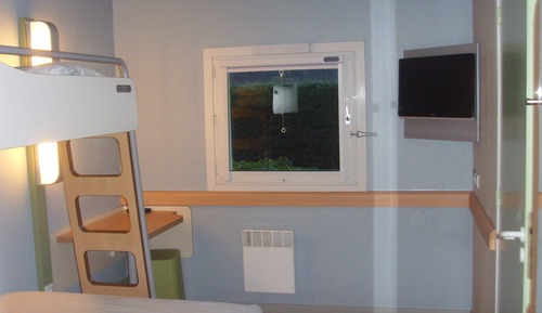 Habitación triple, varias camas