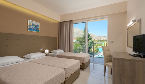 Habitación cuádruple superior, varias camas