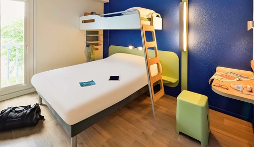 Habitación triple, varias camas