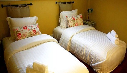 Habitación cuádruple Deluxe, varias camas