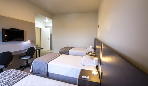 Habitación triple ejecutiva