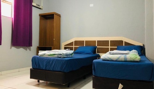 Habitación clásica con 2 camas individuales