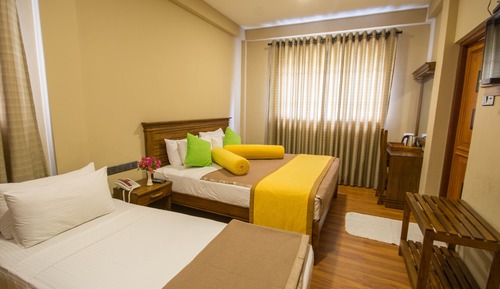 Habitación triple estándar, varias camas