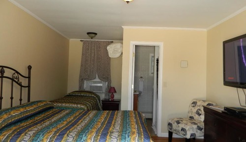 Habitación, varias camas