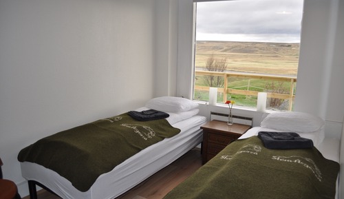 Habitación estándar con 1 cama doble o 2 individuales, baño compartido