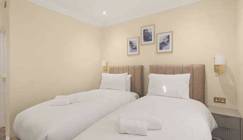Habitación Signature con 2 camas individuales