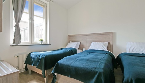 Habitación familiar, varias camas