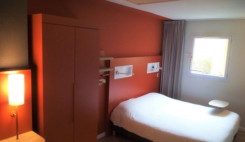 Habitación triple, varias camas