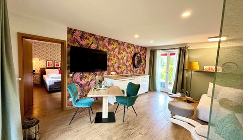 Suite junior, 1 cama de matrimonio, balcón, vistas al jardín