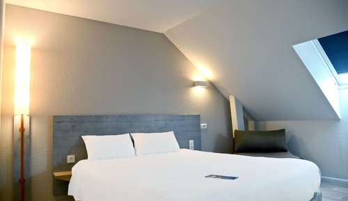 Habitación triple, varias camas