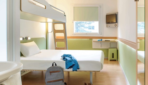 Habitación triple, varias camas