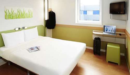 Habitación triple, varias camas