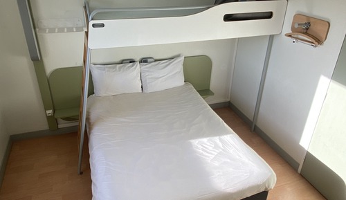 Habitación triple, varias camas