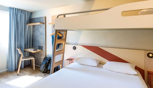 Habitación triple, varias camas