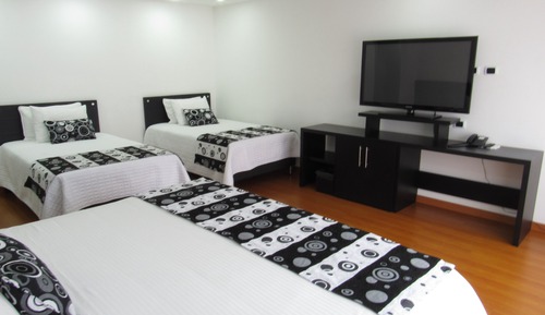 Habitación triple ejecutiva
