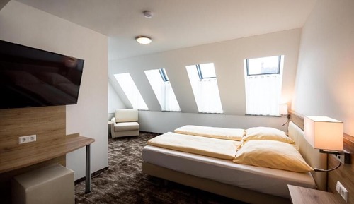 Habitación triple, vistas a la ciudad