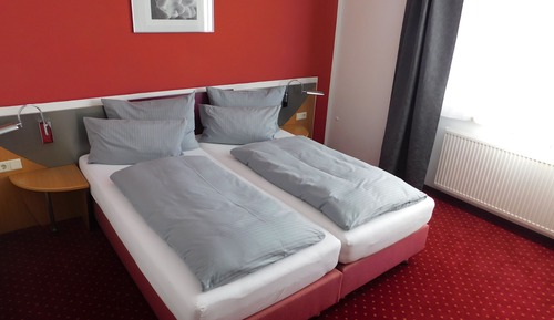 Habitación Business con 1 cama doble o 2 individuales