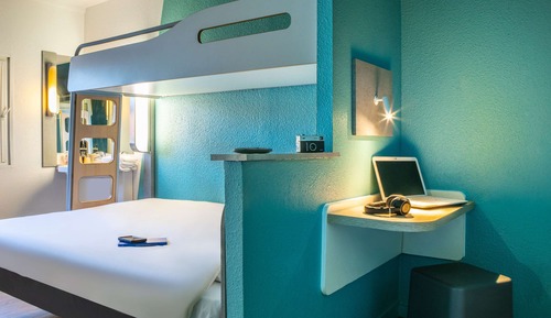 Habitación triple, varias camas