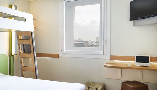 Habitación triple, varias camas