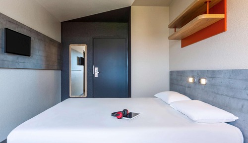 Habitación triple, varias camas