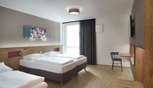 Habitación triple familiar, varias camas