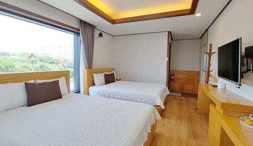 Habitación familiar con 2 camas individuales