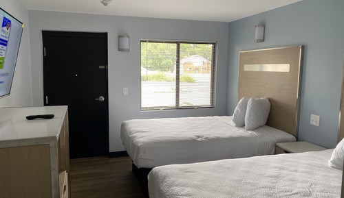 Habitación doble, varias camas
