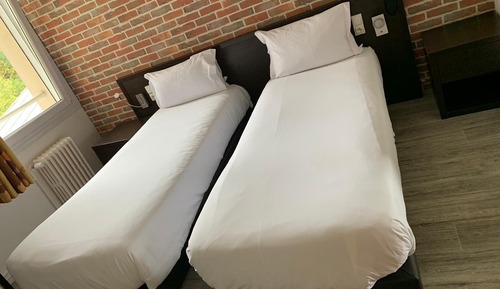 Habitación Confort con 1 cama doble o 2 individuales