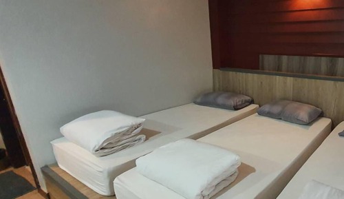 Habitación triple Deluxe