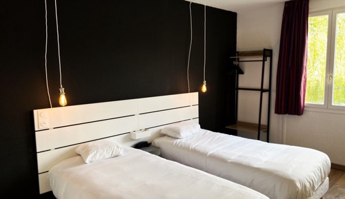 Habitación Confort con 1 cama doble o 2 individuales