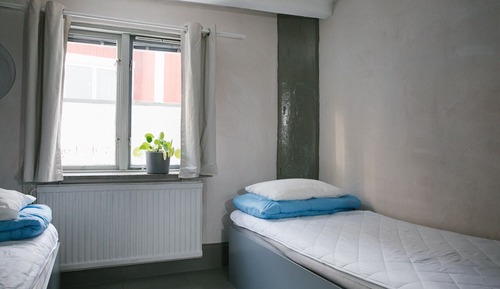 Habitación triple, baño compartido