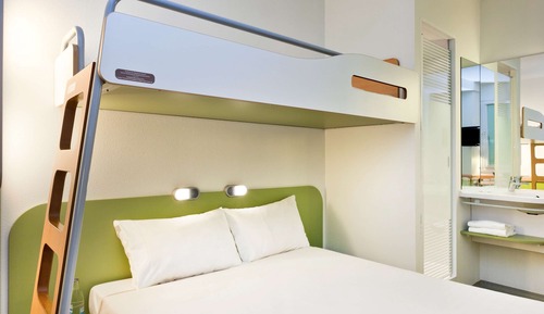 Habitación triple, varias camas