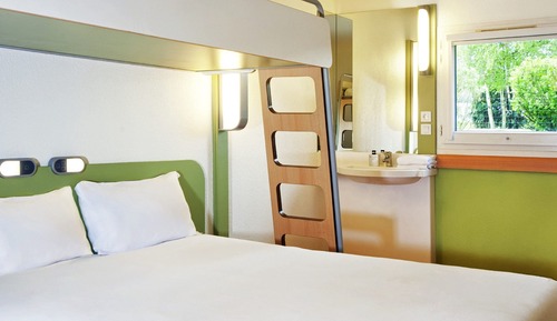 Habitación triple, varias camas