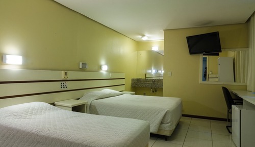 Habitación triple Deluxe, varias camas