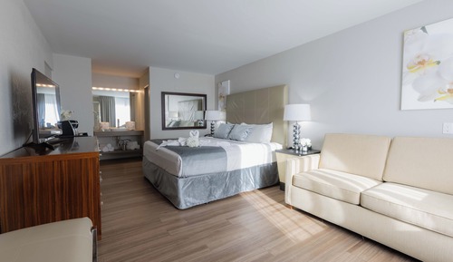 Habitación Elite, 1 cama de matrimonio grande con sofá cama, vistas a la piscina
