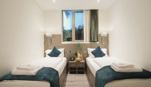 Habitación clásica con 2 camas individuales, baño privado