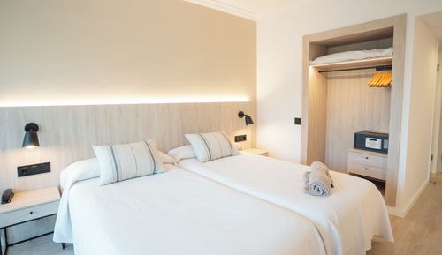 Habitación Twin (Vista Frontal, 2 adultos y 1 niño)