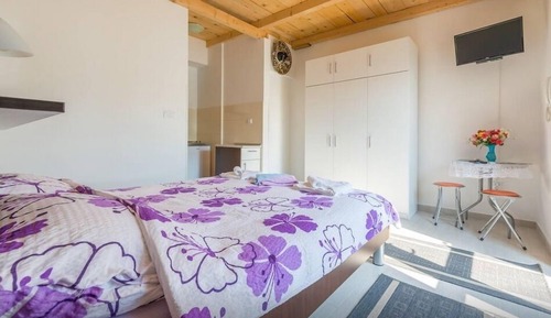 Estudio romántico, 1 cama de matrimonio, terraza, frente a la playa