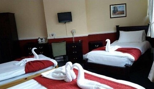Suite superior, baño privado (DBL + 1SGL)