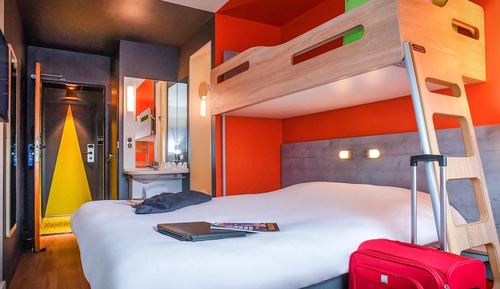 Habitación triple, varias camas