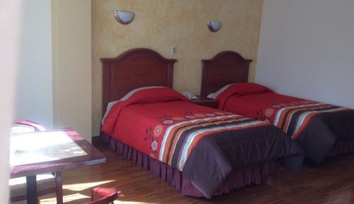 Habitación con 2 camas individuales