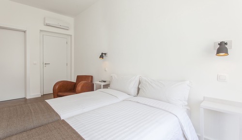 Habitación con 2 camas individuales, vistas a la ciudad