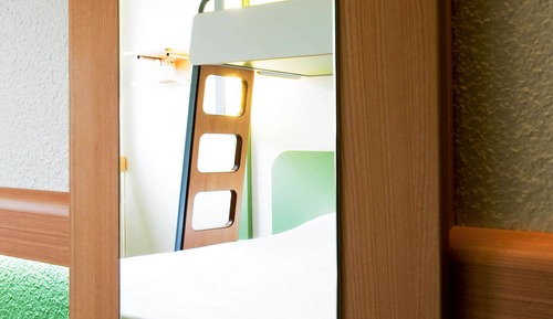 Habitación triple, varias camas