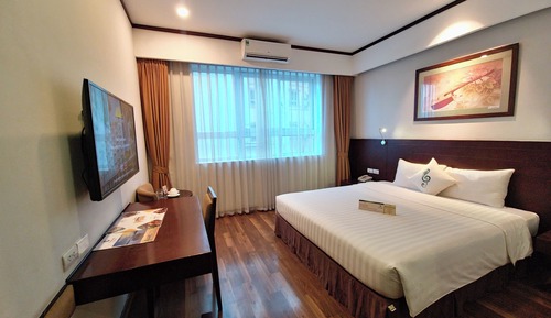 Habitación Deluxe con 1 cama doble o 2 individuales