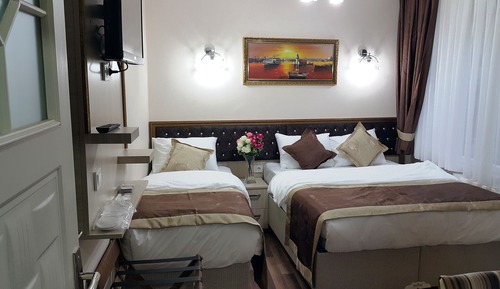 Habitación triple Deluxe