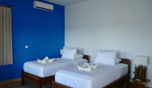 Habitación superior con 1 cama doble o 2 individuales, vistas al mar