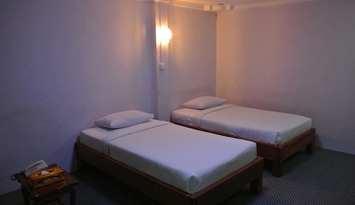 Habitación superior con 1 cama doble o 2 individuales
