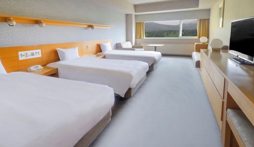 Habitación Premium, varias camas