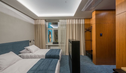 Habitación estándar con 1 cama doble o 2 individuales (single use)